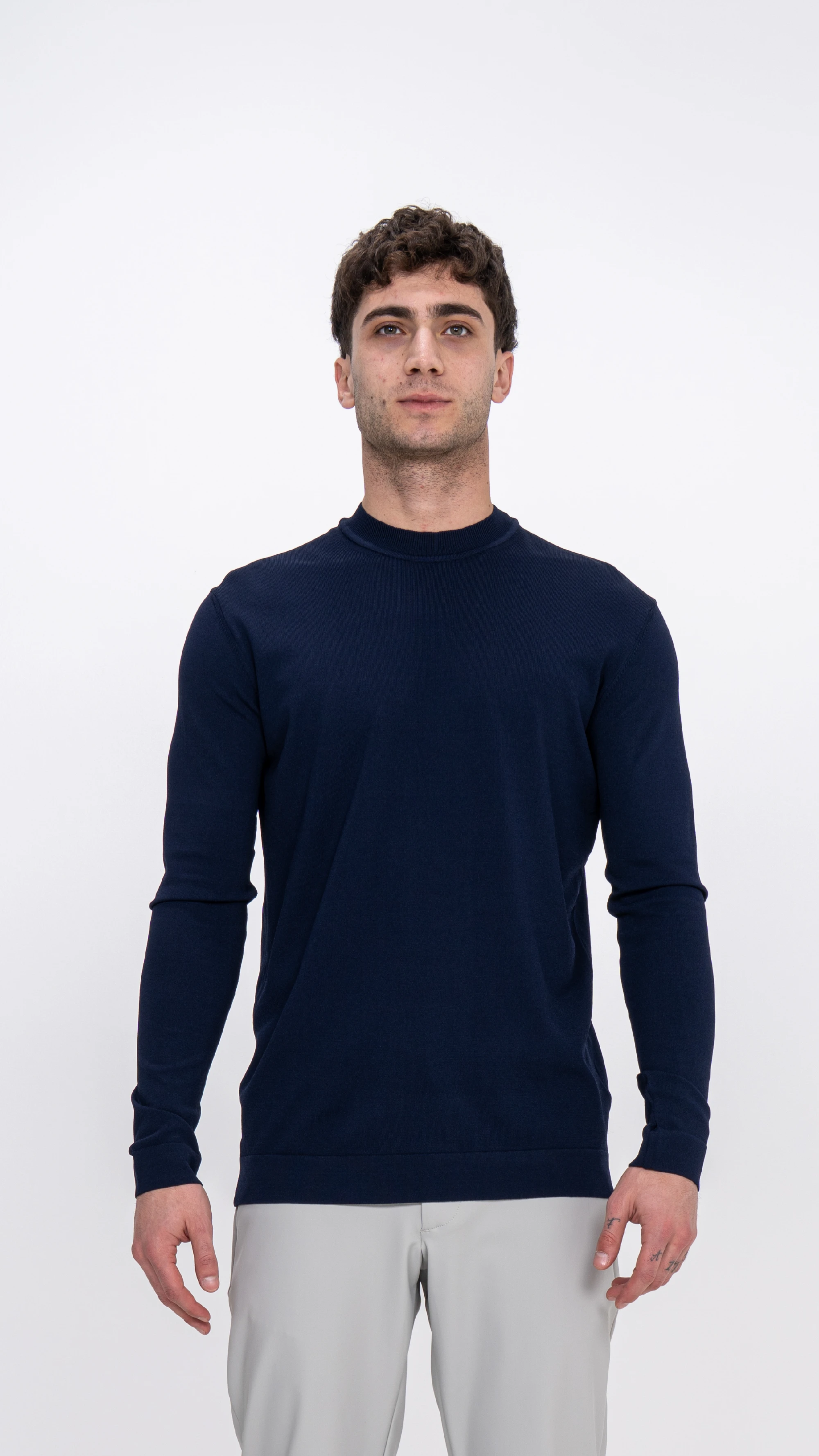 Round Neck Sweater.